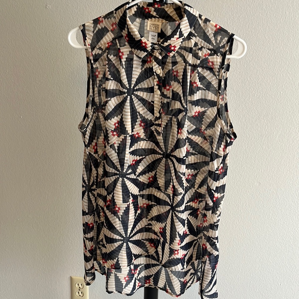 Darling sleeveless shear blouse , half button up with collar